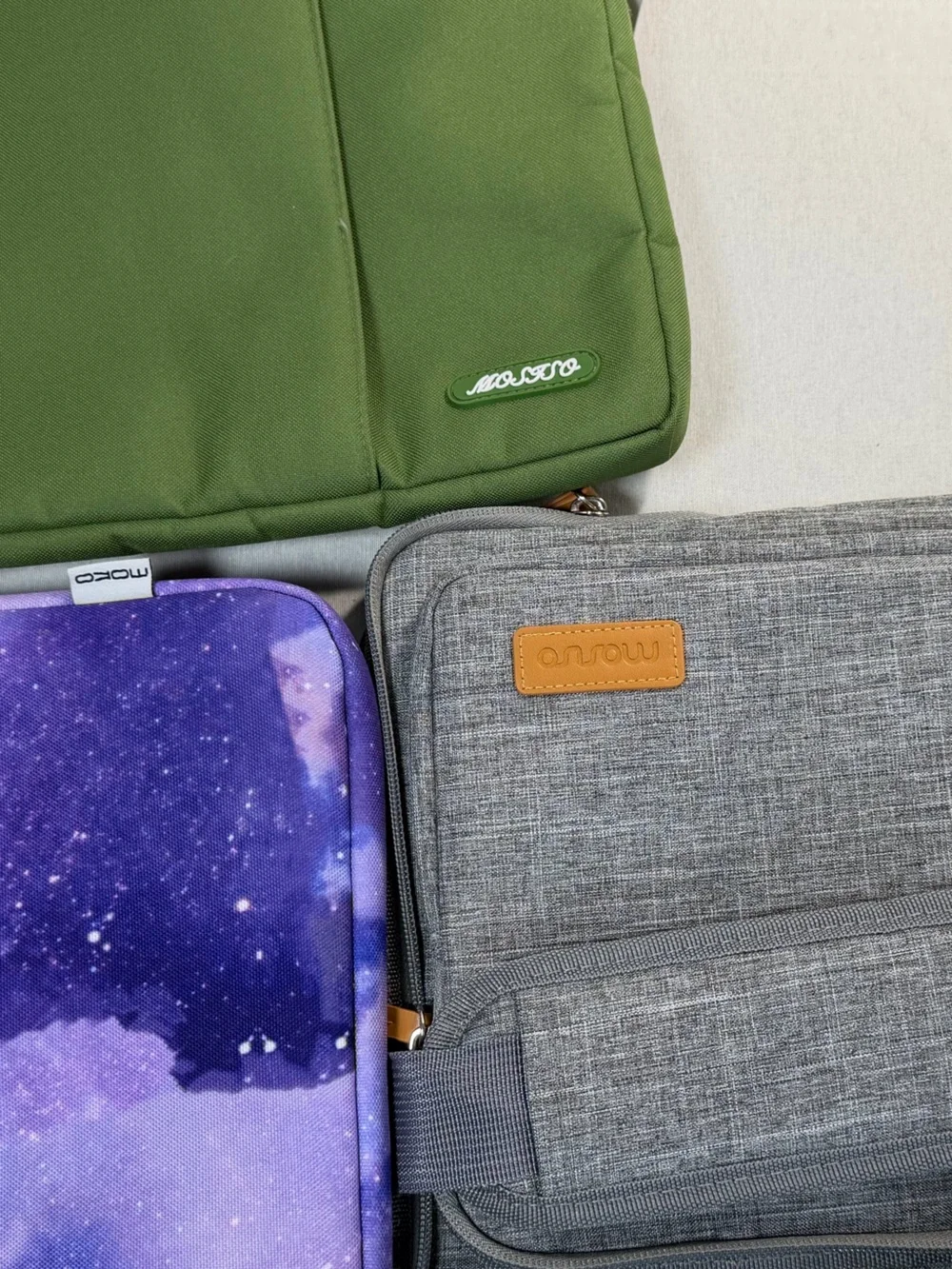 Lot of 3. Two laptop sleeves and one travel shoulder bag. Mosiso and Moko.